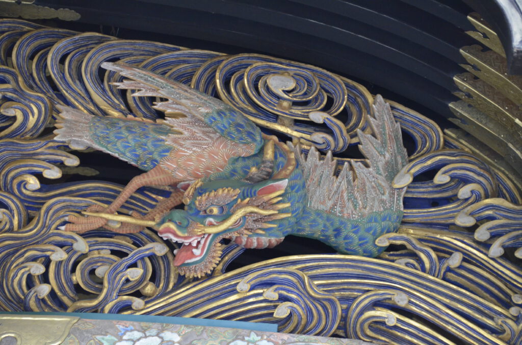 Japanese Dragon surrounded by element as part of the temple complex at Mt. Takao.