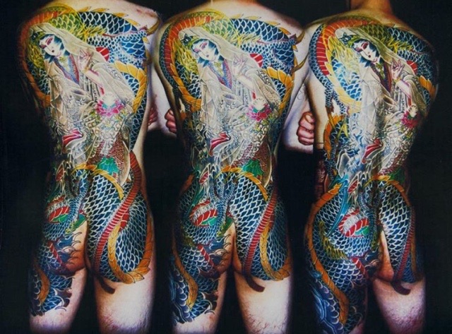 Full view of a tattooed Japanese Dragon across a mans complete back.
Irezumi, Horimono, Princess Kannon