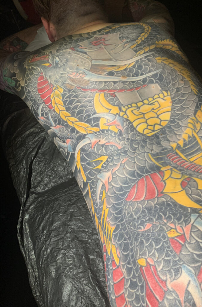 Full backpiece tattoo of a Japanese Dragon called Kurikara Ryu Ou. Irezumi, Horimono, Wabori